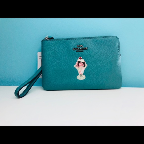 Coach Handbags - Sold Coach corner zip wristlet ice cream